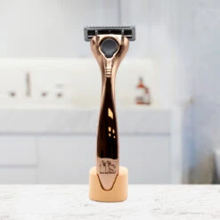 Premium Razor Stand -Ffs Sales Store product img razor stand peach with razor lifestyle 8b1b461f 5886 4295 b217 de803b6b72d4