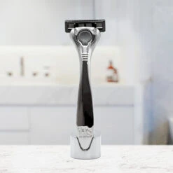 Premium Razor Stand -Ffs Sales Store product img razor stand silver with razor lifestyle 59ba4fc9 769e 4ce1 84fe ac479b16eaf9